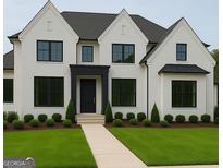 Charming white two-story home with a well-manicured lawn and black window trim at 2868 Octavia Cir, Marietta, GA 30062