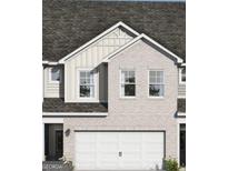 Charming brick home with a two-car garage and a classic architectural design at 2276 Santa Fe St # 19, Morrow, GA 30260