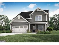 Charming two-story home with gray siding, white trim, and attached two-car garage at 313 Limestone Circle, Conyers, GA 30013
