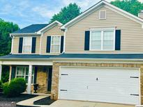 Charming two-story home with brick and vinyl siding, complemented by a well-maintained front yard at 789 Winbrook Dr # 1, Mcdonough, GA 30253