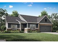 New construction with a gray exterior, brick accents, and a well-manicured lawn at 474 Cantrell Drive, Dallas, GA 30157