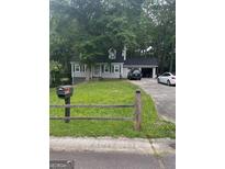 Charming two-story home with a well-maintained lawn and mailbox at 4514 Tifton Ct, Powder Springs, GA 30127