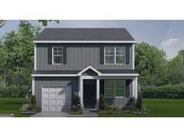 Charming two-story home featuring gray siding, black shutters, and a well-manicured front lawn at 5449 Baybrook Cir, South Fulton, GA 30349