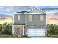 Charming two-story home with gray siding and a brick front, complemented by a well-manicured lawn at 5455 Baybrook Cir, South Fulton, GA 30349