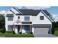 Charming two-story home featuring a white brick exterior, black framed windows, and a gray garage door at 315 Westfall Ter # 226A, Loganville, GA 30052