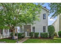 Charming two-story home with well-maintained landscaping and a welcoming front porch, perfect for enjoying the outdoors at 747 Gardenside, Marietta, GA 30067