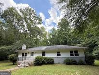 Charming single-story home with a brick foundation and a well-maintained front yard at 616 Inman Rd # B, Fayetteville, GA 30215