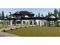 Stunning two-story home with a modern design and beautifully landscaped front yard at 105 Robinwood Ct, Fayetteville, GA 30214