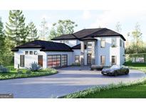 Stunning modern home with a spacious driveway, lush landscaping, and an attached two car garage at 3181 Buck Branch Rd, Conyers, GA 30094