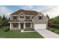 Charming two-story home with brick accents, a two-car garage, and professionally landscaped yard at 3623 Squires Park Ln, Loganville, GA 30052