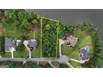 Beautiful wooded land available in a lakeside community, ready for a custom home at 81 Smokerise Pt, Peachtree City, GA 30269