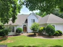 Charming one-story home with mature landscaping and inviting entrance, showing great curb appeal at 2911 Chesterfield Se Way, Conyers, GA 30013