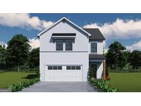 Charming two-story home with a white brick and siding exterior, and an attached two-car garage at 4434 Eastbrook Pl # 59A, Snellville, GA 30039