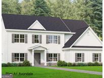 New construction home featuring a charming two-story with gray shutters and stone foundation at 115 Seymour Place, Fayetteville, GA 30214