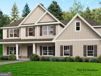 Charming two-story home with beige siding, brown shutters and lush green lawn at 170 Liberty Drive, Fayetteville, GA 30214