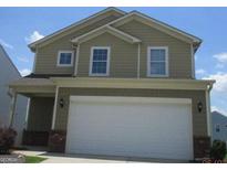 Charming two-story home featuring a spacious two-car garage and inviting curb appeal at 505 Mariposa Ln, Mcdonough, GA 30253