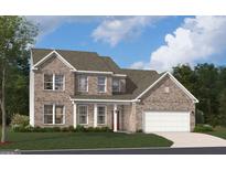 Charming brick two-story home with a well-manicured lawn and attached two-car garage at 714 Ocmulgee Crossing, Locust Grove, GA 30248