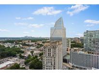 Aerial view of cityscape with modern high-rise building at 3324 Peachtree Ne Rd # 2718, Atlanta, GA 30326