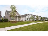 New homes community with sidewalks and well-manicured lawns at 505 Godfrey Dr, Cumming, GA 30040