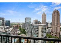 Stunning city view from the balcony featuring nearby skyscrapers on a bright, sunny day at 1080 Peachtree Ne St # 2512, Atlanta, GA 30309