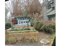 Cedar Chase private community entrance sign with festive holiday decor at 102 Cedar Chase Rd, Atlanta, GA 30324