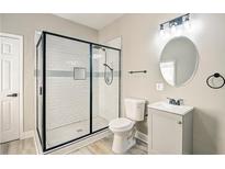 Modern bathroom with a large shower and updated vanity at 1581 Linda Sw Way, Atlanta, GA 30310