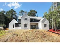 New two-story home construction with white brick and gray accents, showing a partially landscaped lot at 440 Allyson Cir, Alpharetta, GA 30009