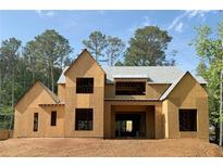 Unfinished two-story home featuring a gable roof, framed windows, and wood sheathing at 440 Allyson Cir, Alpharetta, GA 30009