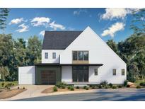 Modern two-story home with white siding, black trim, and a stylish garage door at 170 Cedarwood Ln, Roswell, GA 30075