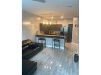 Open concept kitchen and living area with modern appliances and stylish furnishings at 870 Mayson Turner Nw Rd # 1102, Atlanta, GA 30314