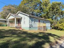 Cute bungalow with front porch and deck, nicely landscaped at 41 Meldon Se Ave, Atlanta, GA 30315