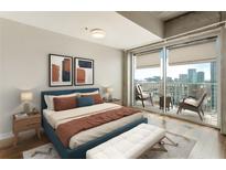 Bright bedroom with a large balcony offering city views, complemented by a comfortable queen bed and modern furnishings at 361 17Th Nw St # 1001, Atlanta, GA 30363