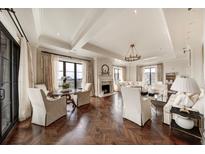 Elegant living room featuring hardwood floors, high ceilings, and ample natural light at 88 W Paces Ferry Nw Rd # 1740, Atlanta, GA 30305