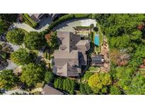 Stunning aerial view of the estate showcasing the pool, landscaping, and architectural design at 980 Fenimore Cir, Sandy Springs, GA 30350