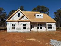 New construction home with a spacious front porch at 1471 Stephens View Dr, Loganville, GA 30052