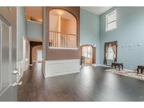 Two-story entry with hardwood floors, and a staircase at 1411 Splitrock Sw Pl, Atlanta, GA 30331