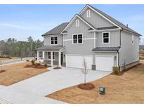 Beautiful home with a two-car garage, a well-maintained lawn, and inviting curb appeal at 67 Hampton Ter, Dallas, GA 30157