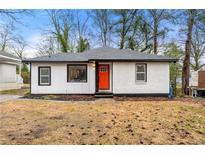 Charming renovated home with a bright orange door at 641 Hamilton E Holmes Nw Dr, Atlanta, GA 30318
