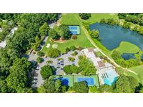 Aerial view of community features including tennis courts, pool, and clubhouse at 10 Chaumont Nw Sq, Atlanta, GA 30327