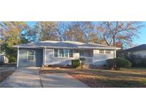 Newly renovated ranch home with a charming front porch and well-manicured lawn at 2756 Gresham Se Rd, Atlanta, GA 30316