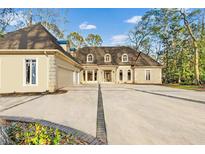 Stunning home with a beautiful driveway and meticulously maintained landscaping at 1840 Brandon Hall Dr, Atlanta, GA 30350