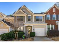 Charming two-story home with a one car garage and manicured landscaping at 208 Kenninghall Ln # 627, Smyrna, GA 30082