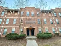 Charming brick condominium complex with manicured landscaping at 245 Amal Sw Dr # 1008, Atlanta, GA 30315