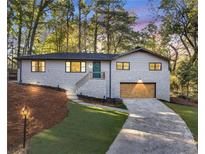 Charming ranch home with stone accents and a landscaped yard at 2873 Bob Bettis Rd, Marietta, GA 30066