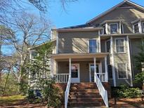 Charming two-story home with brick stairs and a covered entryway, perfect for a cozy welcome at 1409 Oakridge Cir, Decatur, GA 30033