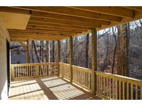 Spacious deck overlooking a wooded area at 6076 Belle Meade Dr, Villa Rica, GA 30180
