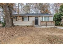 Ranch style home with updated exterior and landscaping at 905 Fairburn Nw Rd, Atlanta, GA 30331