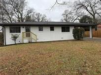 Newly renovated ranch home with fresh paint and landscaping at 2662 Sweetwater St, Austell, GA 30106