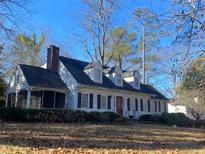 Charming single story home with a spacious front yard at 1998 Sandtown Sw Rd, Atlanta, GA 30311