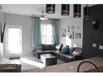 Bright living room with sectional sofa and access to patio at 870 Mayson Turner Nw Rd # 1323, Atlanta, GA 30314